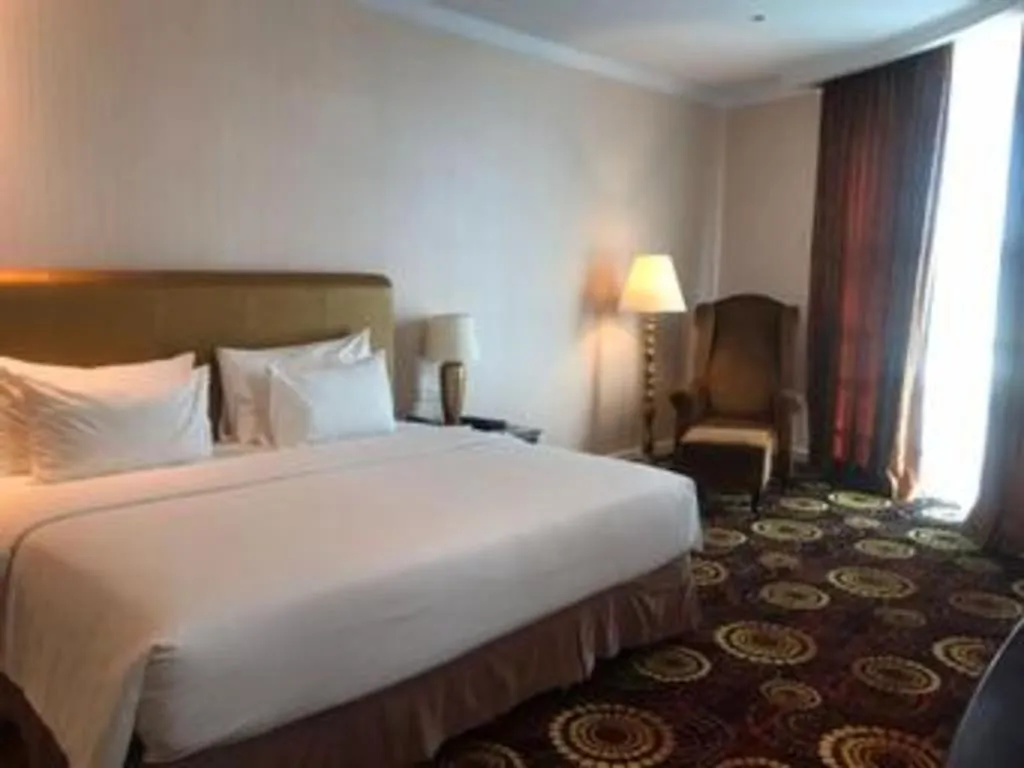 Bed in Adimulia Hotel Medan