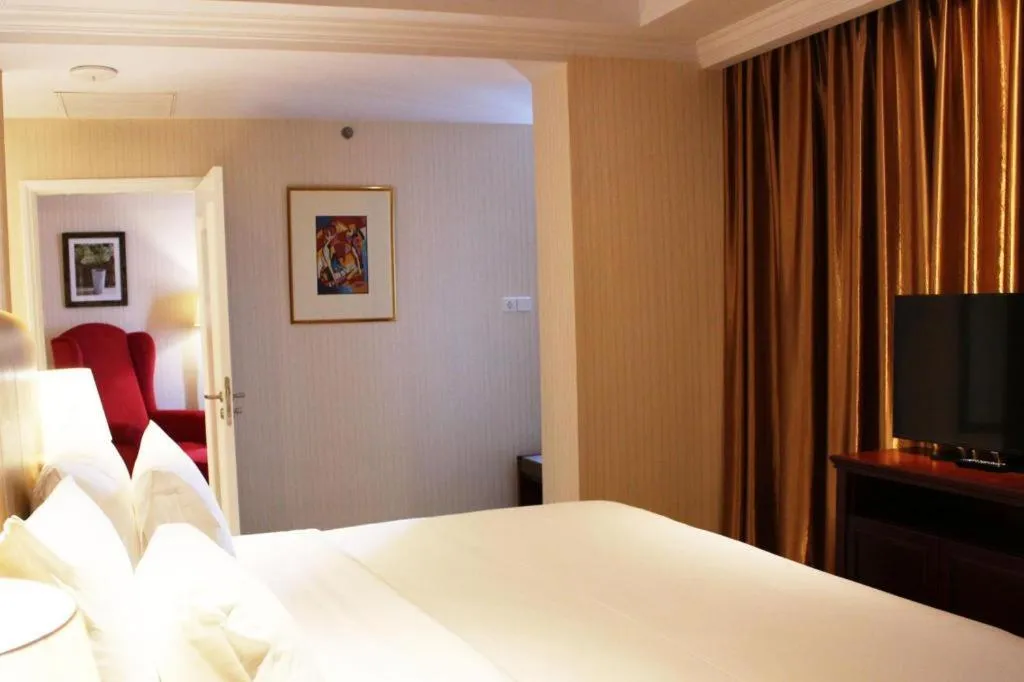 Bed in Adimulia Hotel Medan