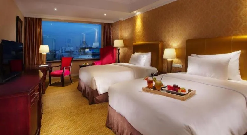 Bed in Adimulia Hotel Medan