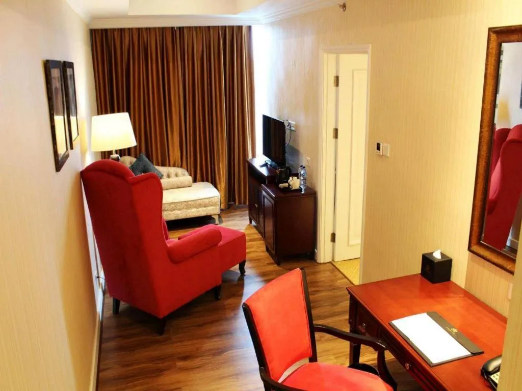 Bed in Adimulia Hotel Medan