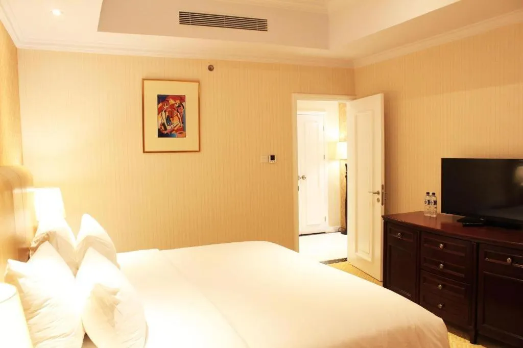 Bed in Adimulia Hotel Medan