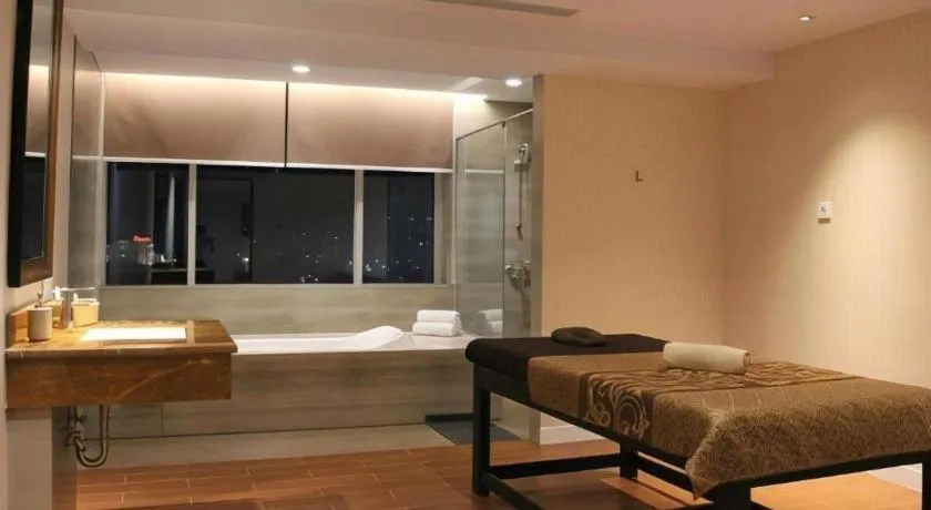 Bed in Adimulia Hotel Medan