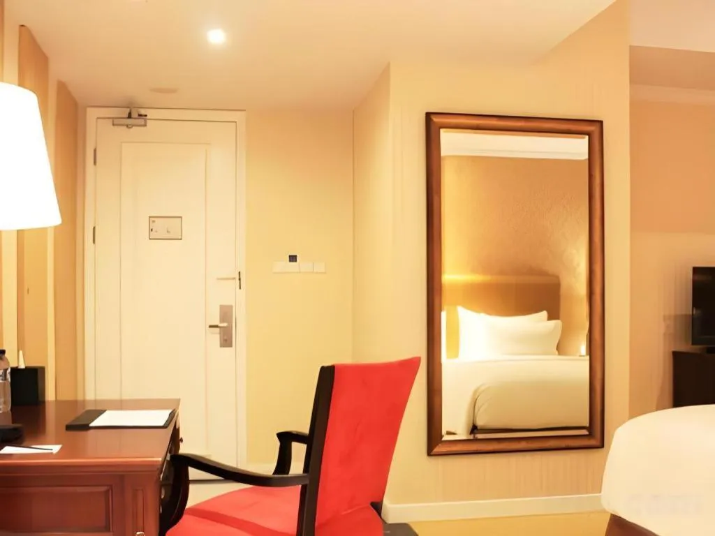 Bed in Adimulia Hotel Medan