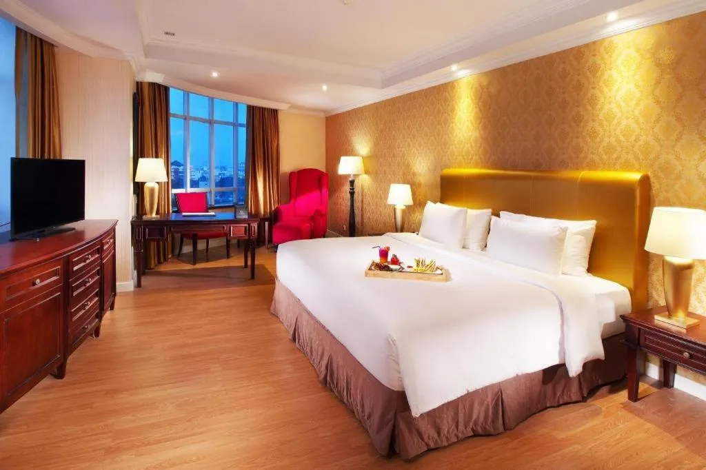 Bed in Adimulia Hotel Medan