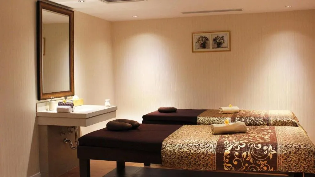 Bed in Adimulia Hotel Medan