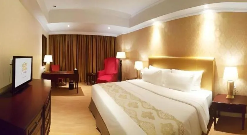 Bed in Adimulia Hotel Medan