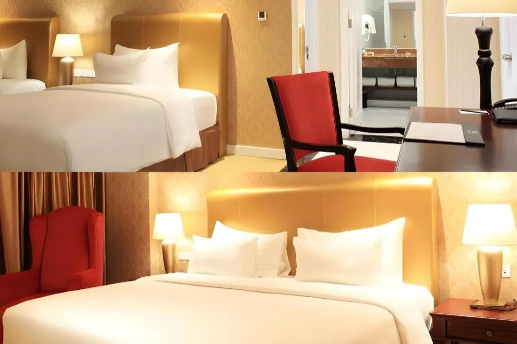 Bed in Adimulia Hotel Medan