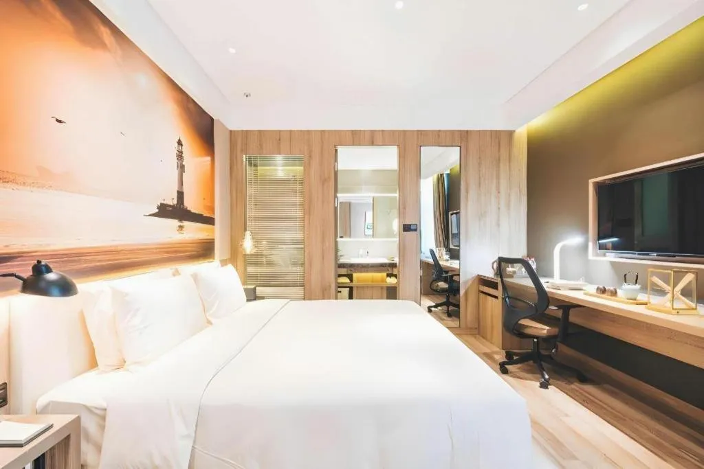 Bed in Vienna Hotel Shanghai Hongqiao Huaxin Road