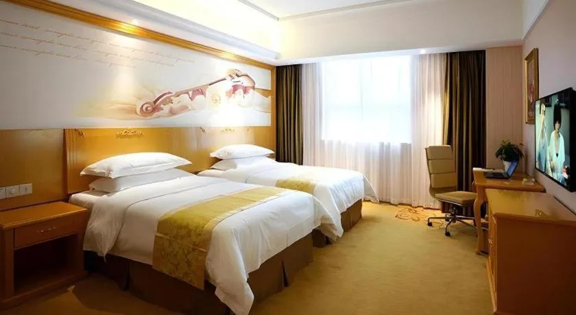 Bed in Vienna Hotel Shanghai Hongqiao Huaxin Road