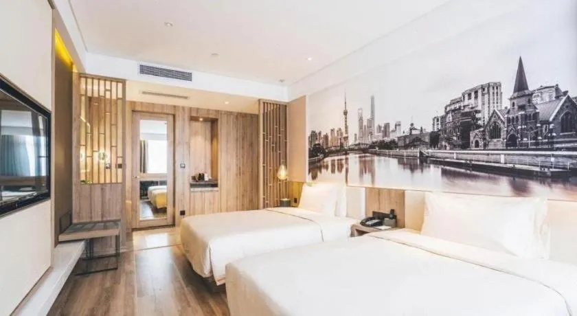 Bed in Vienna Hotel Shanghai Hongqiao Huaxin Road