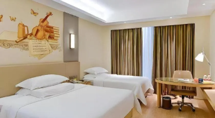 Bed in Vienna International Hotel Chengdu New Global Exhibition Center