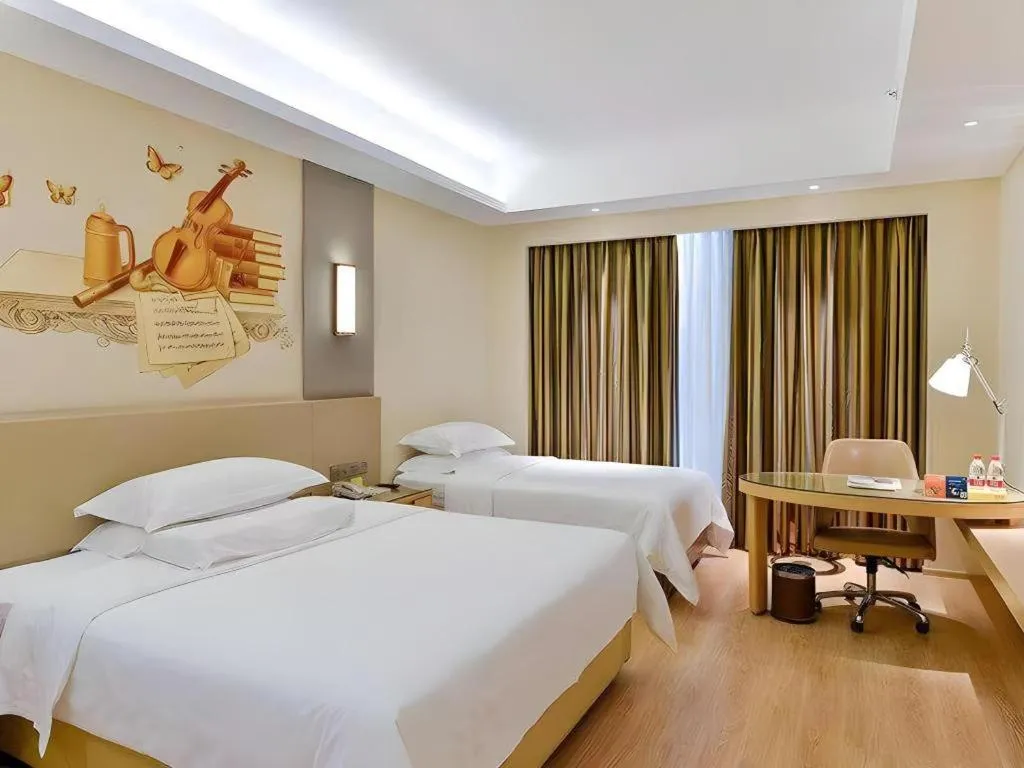 Bed in Vienna International Hotel Chengdu New Global Exhibition Center