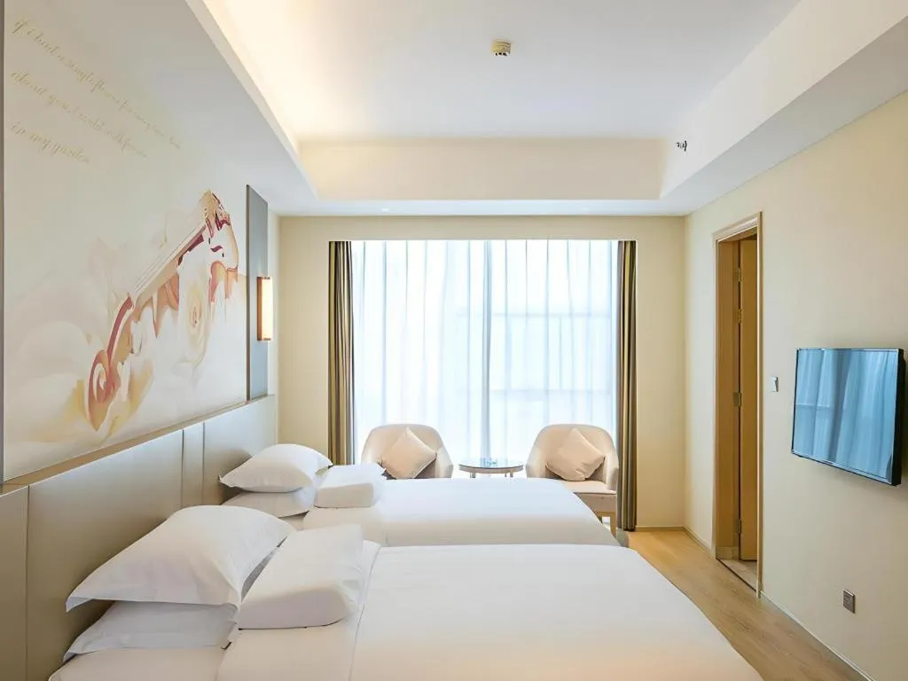 Bed in Vienna International Hotel Chengdu New Global Exhibition Center