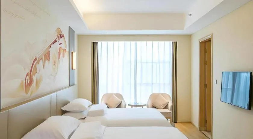 Bed in Vienna International Hotel Chengdu New Global Exhibition Center