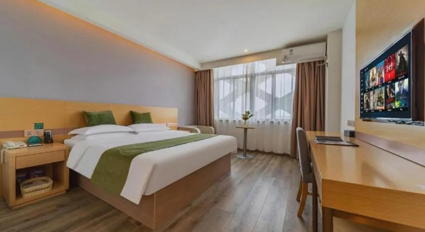 Bed in GreenTree Inn Nantong Zhangzhishan Town Deli Plaza Express Hotel