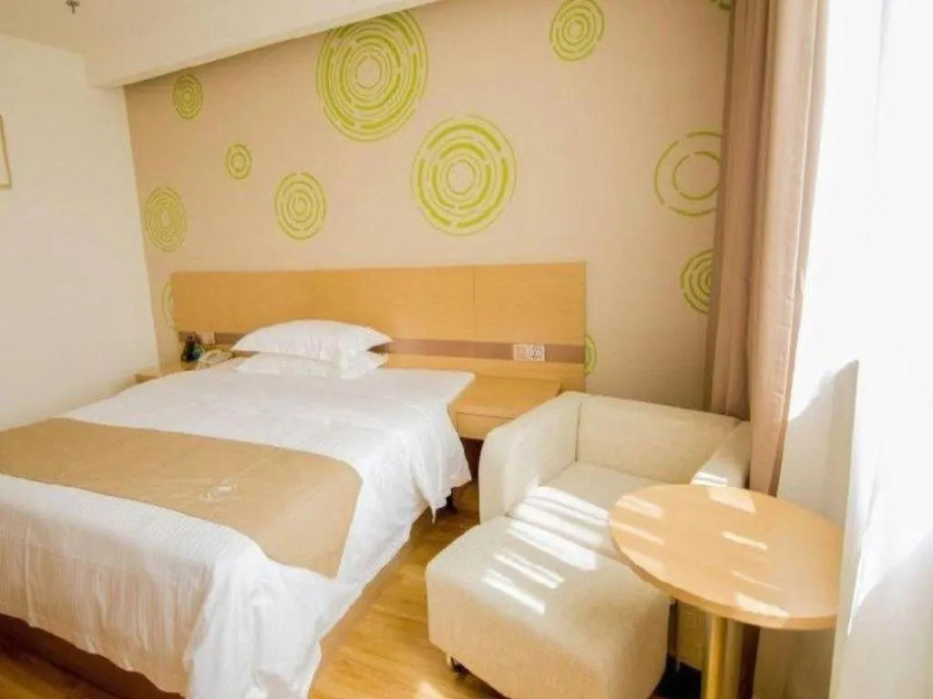 Bed in GreenTree Inn Nantong Zhangzhishan Town Deli Plaza Express Hotel