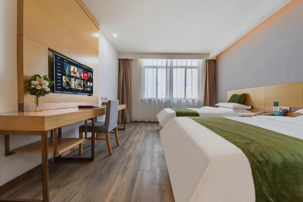 Bed in GreenTree Inn Nantong Zhangzhishan Town Deli Plaza Express Hotel