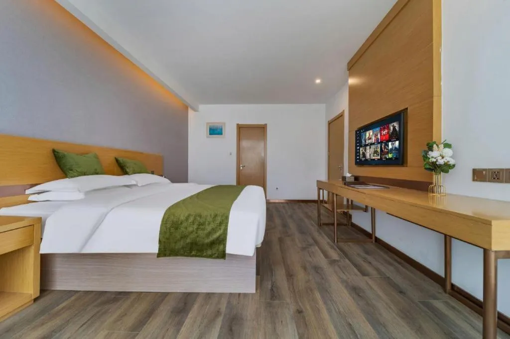 Bed in GreenTree Inn Nantong Zhangzhishan Town Deli Plaza Express Hotel