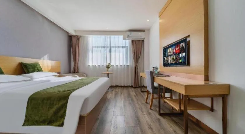 Bed in GreenTree Inn Nantong Zhangzhishan Town Deli Plaza Express Hotel