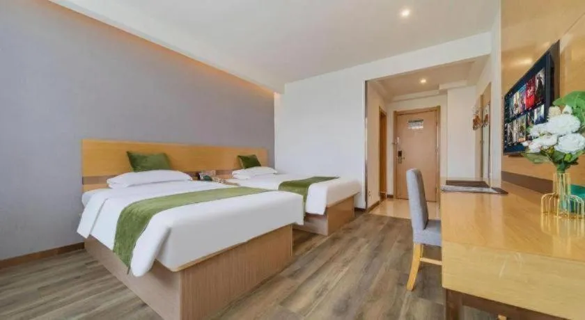 Bed in GreenTree Inn Nantong Zhangzhishan Town Deli Plaza Express Hotel