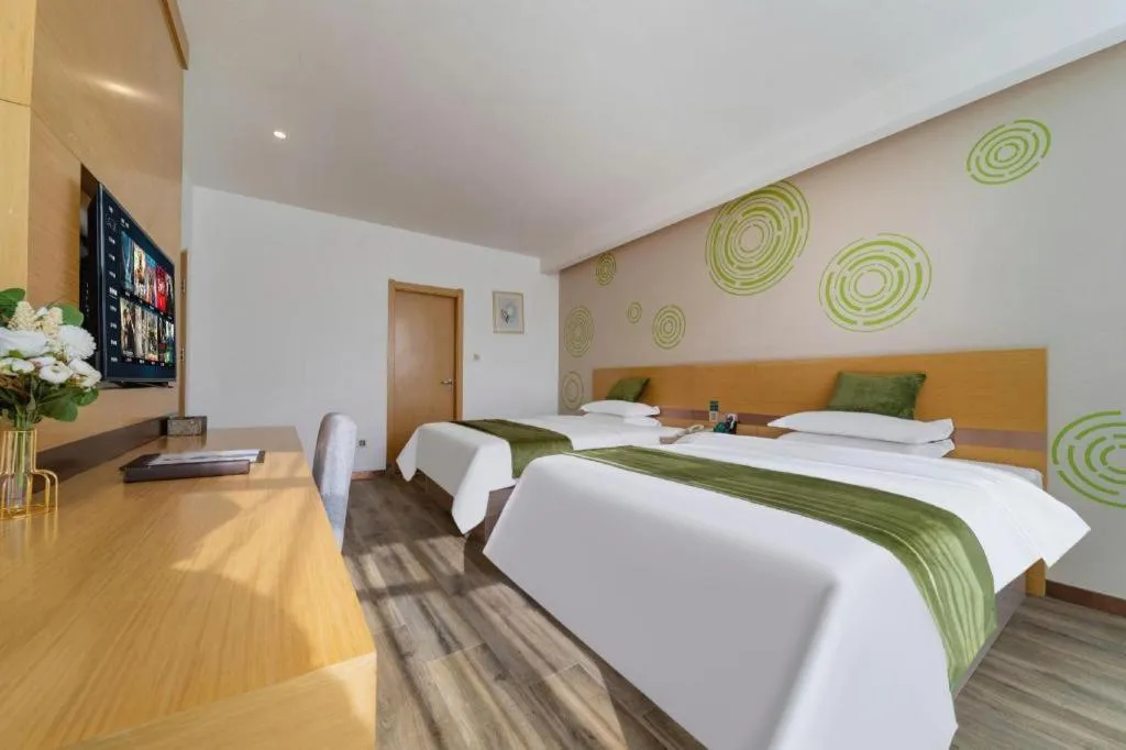 Bed in GreenTree Inn Nantong Zhangzhishan Town Deli Plaza Express Hotel