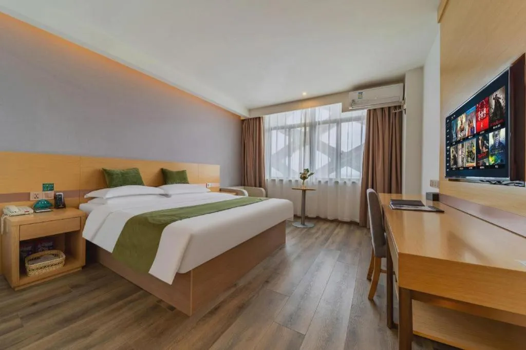 Bed in GreenTree Inn Nantong Zhangzhishan Town Deli Plaza Express Hotel