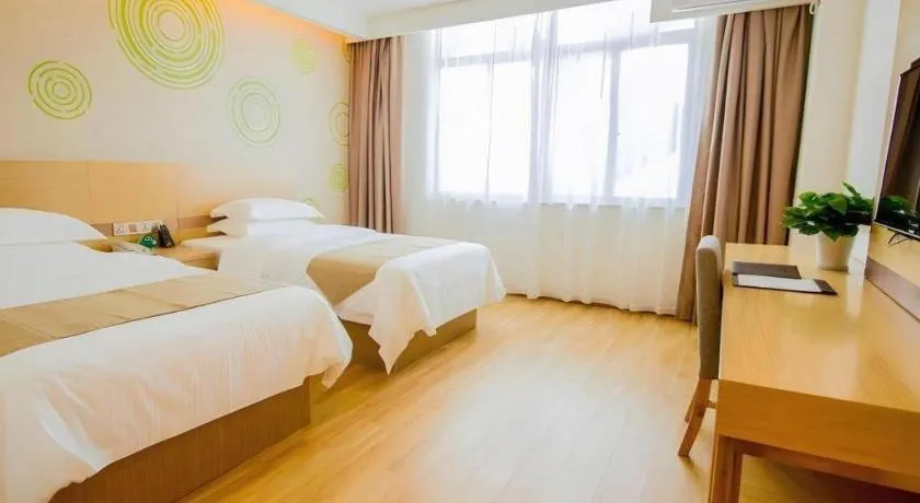 Bed in GreenTree Inn Nantong Zhangzhishan Town Deli Plaza Express Hotel