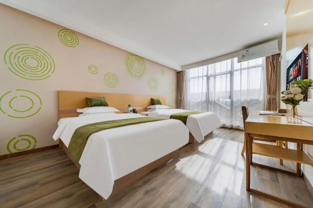 Bed in GreenTree Inn Nantong Zhangzhishan Town Deli Plaza Express Hotel