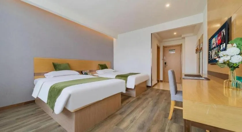 Bed in GreenTree Inn Nantong Zhangzhishan Town Deli Plaza Express Hotel