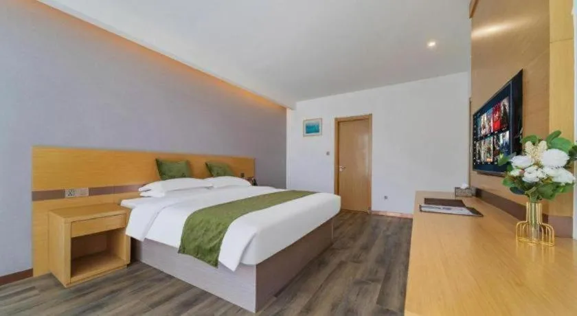 Bed in GreenTree Inn Nantong Zhangzhishan Town Deli Plaza Express Hotel