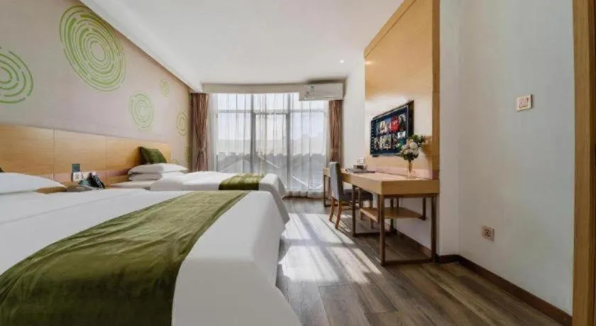 Bed in GreenTree Inn Nantong Zhangzhishan Town Deli Plaza Express Hotel