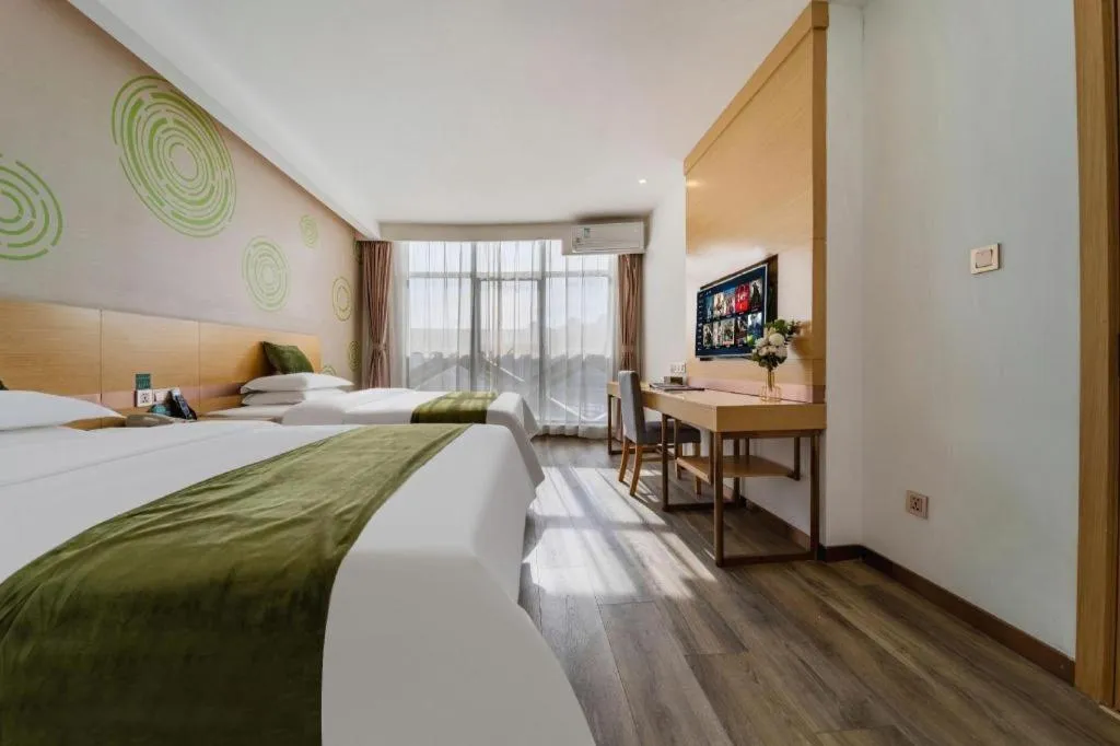Bed in GreenTree Inn Nantong Zhangzhishan Town Deli Plaza Express Hotel