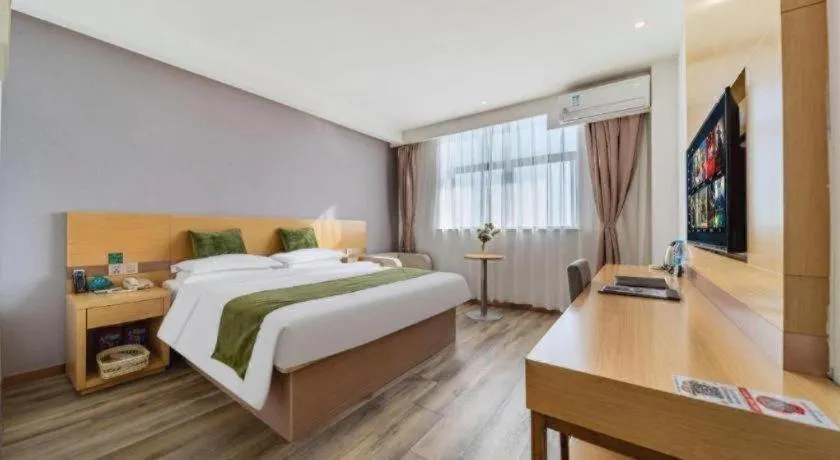 Bed in GreenTree Inn Nantong Zhangzhishan Town Deli Plaza Express Hotel