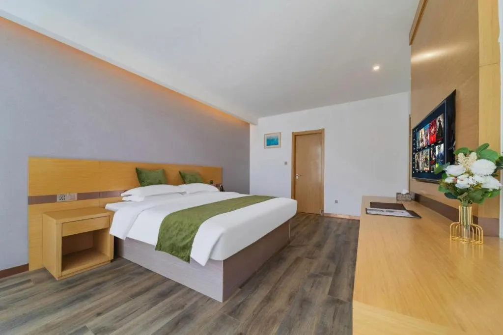 Bed in GreenTree Inn Nantong Zhangzhishan Town Deli Plaza Express Hotel