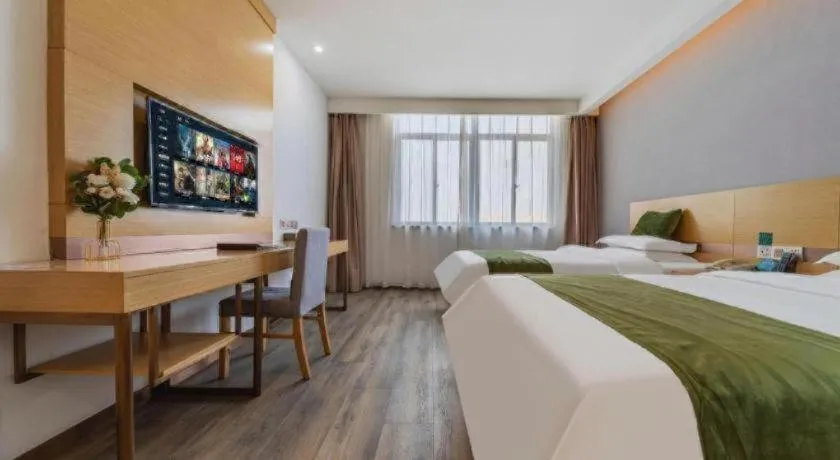 Bed in GreenTree Inn Nantong Zhangzhishan Town Deli Plaza Express Hotel