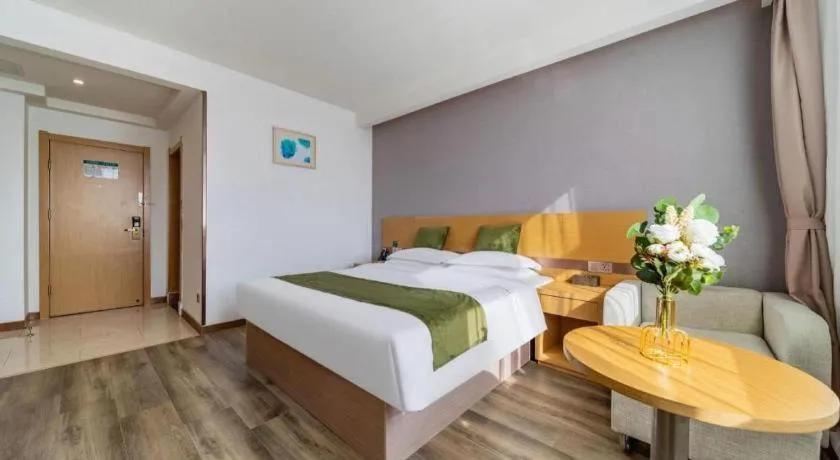 Bed in GreenTree Inn Nantong Zhangzhishan Town Deli Plaza Express Hotel