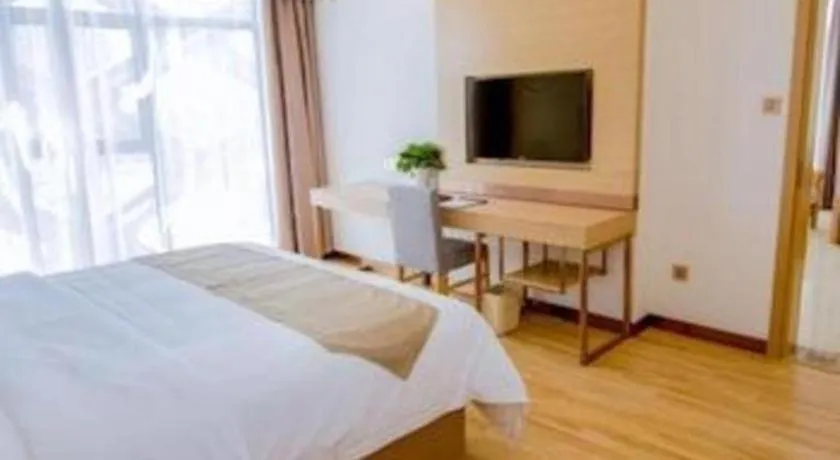 Bed in GreenTree Inn Nantong Zhangzhishan Town Deli Plaza Express Hotel