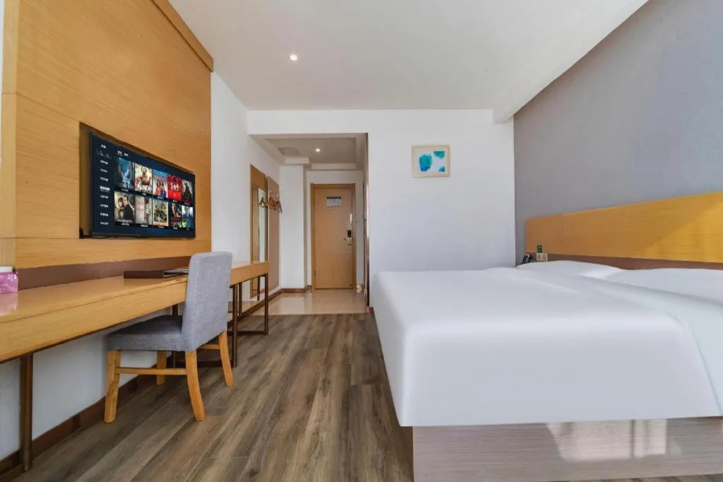 Bed in GreenTree Inn Nantong Zhangzhishan Town Deli Plaza Express Hotel