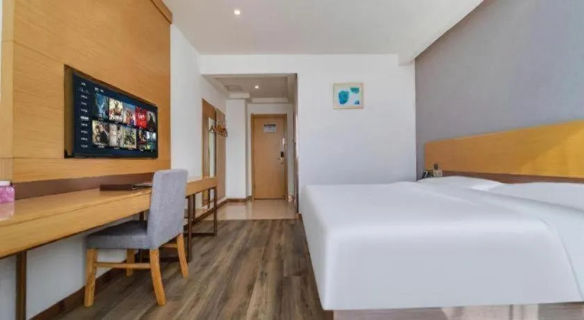 Bed in GreenTree Inn Nantong Zhangzhishan Town Deli Plaza Express Hotel