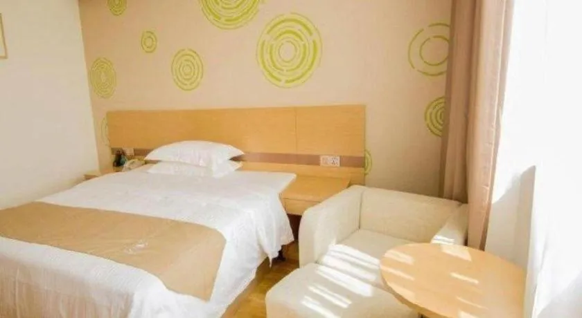 Bed in GreenTree Inn Nantong Zhangzhishan Town Deli Plaza Express Hotel