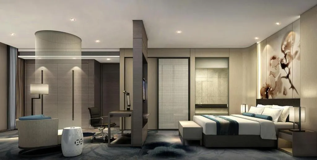 Bed in LONGYAN JINGHUA FLIPORT HOTEL