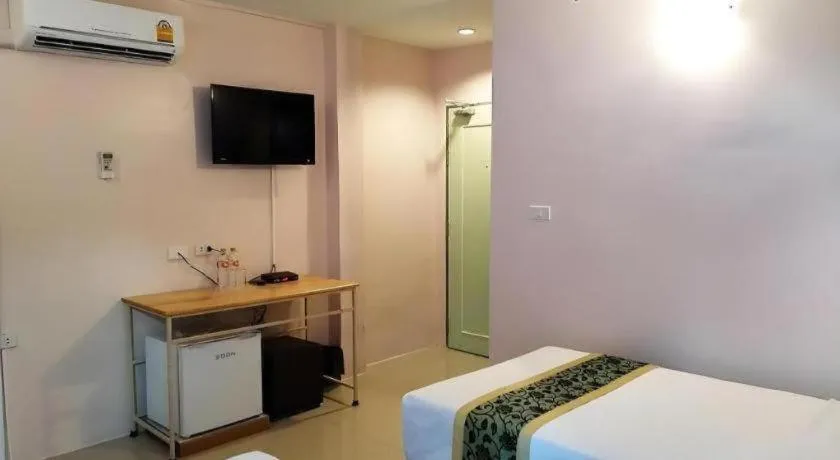 Bed in BIRD ROOM HOTEL - PRATUNAM