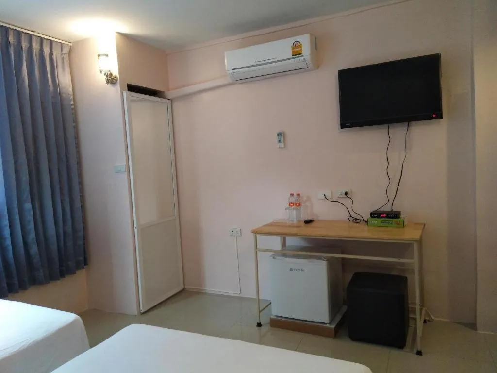 Bed in BIRD ROOM HOTEL - PRATUNAM