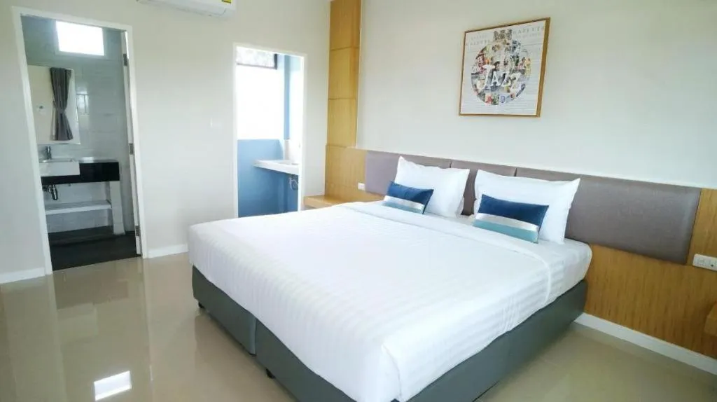 Bed in APA-TREE Boutique Hotel