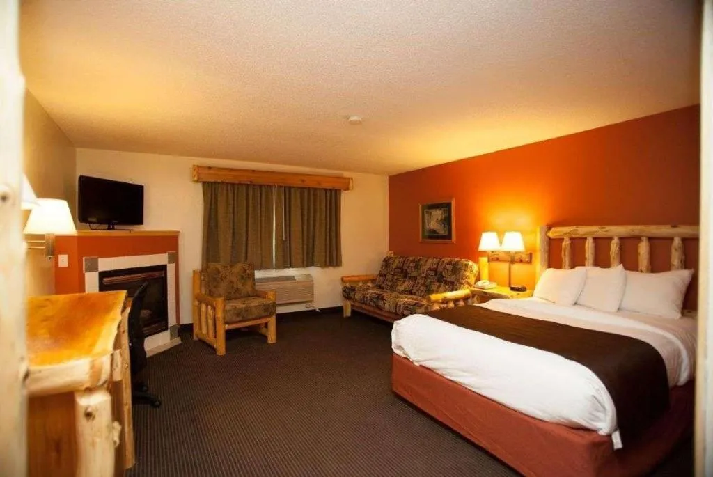 Bed in AmericInn by Wyndham Pequot Lakes