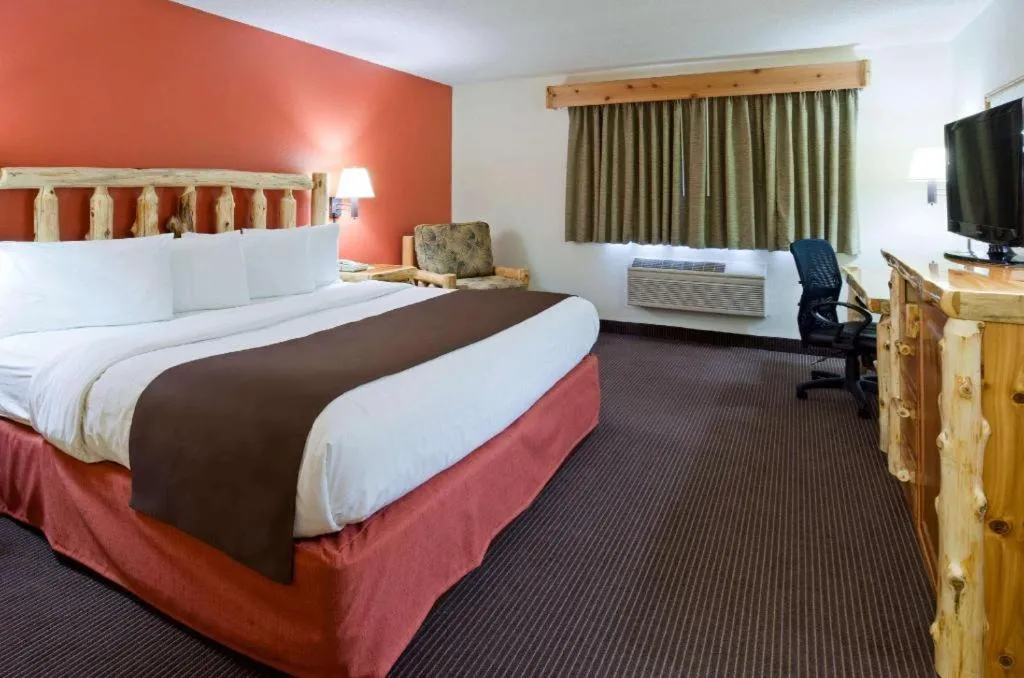 Bed in AmericInn by Wyndham Pequot Lakes