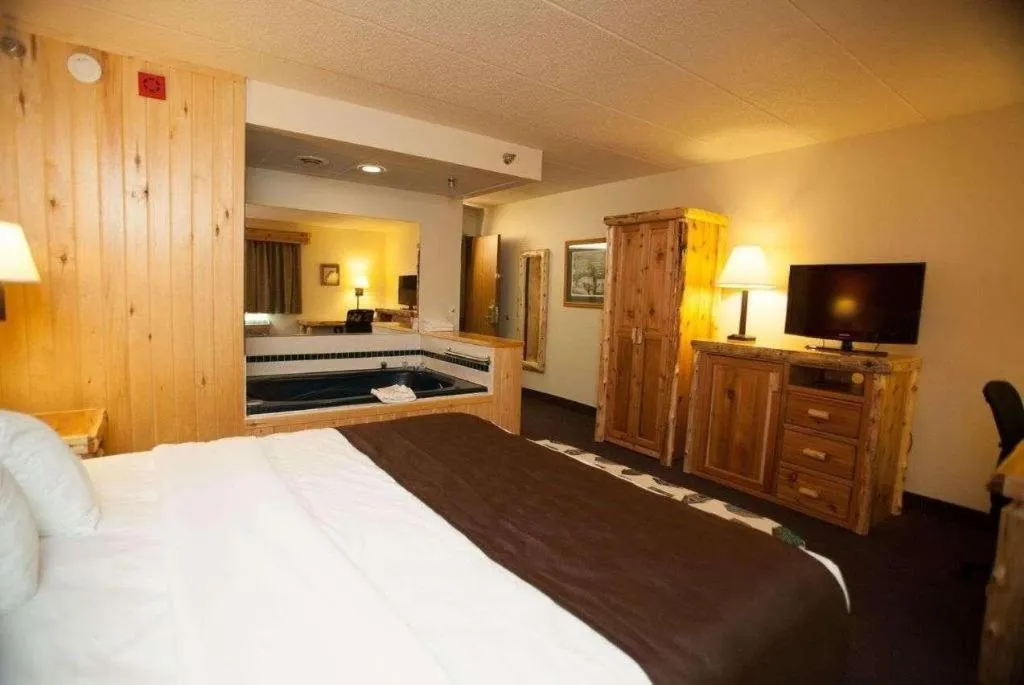 Bed in AmericInn by Wyndham Pequot Lakes