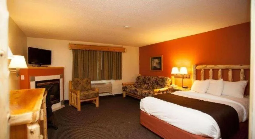 Bed in AmericInn by Wyndham Pequot Lakes