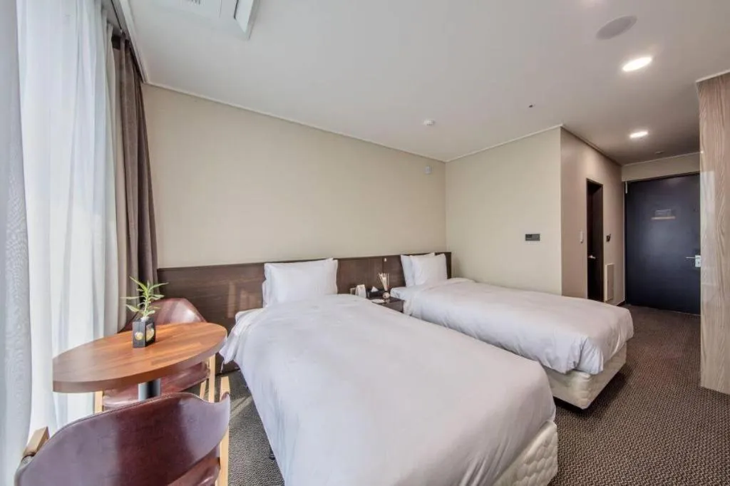 Bed in Riviera Incheon Airport Hotel