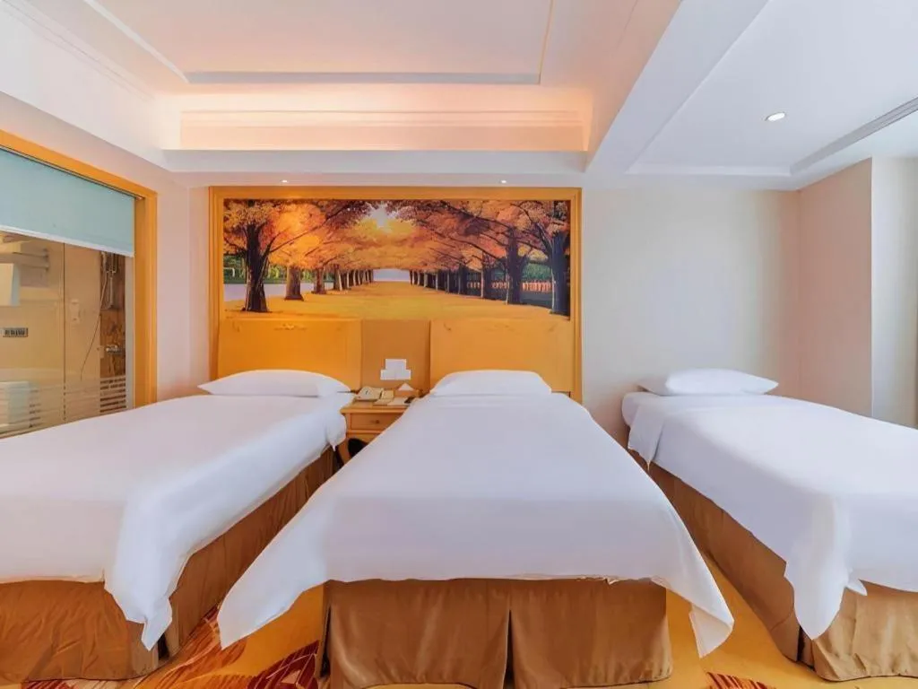 Bed in Vienna Hotel Guangdong Qingyuan Wanda Plaza Xincheng Beijiang